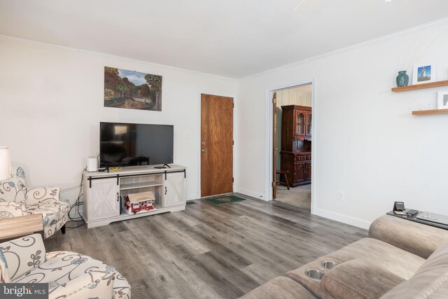 1036 S Schumaker Dr, Salisbury, MD 21804 - living room featuring baseboards, crown molding, and wood finished floors