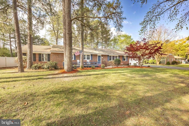 1036 S Schumaker Dr, Salisbury, MD 21804 - ranch-style house featuring brick siding, fence, and a front yard
