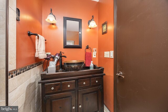 1036 S Schumaker Dr, Salisbury, MD 21804 - bathroom featuring tile walls and vanity