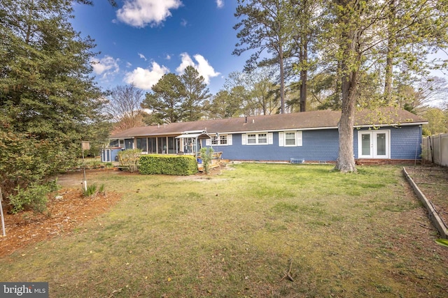 1036 S Schumaker Dr, Salisbury, MD 21804 - back of house with french doors, a sunroom, fence, and a lawn