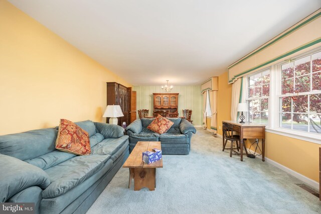 1036 S Schumaker Dr, Salisbury, MD 21804 - carpeted living area featuring baseboards and a notable chandelier