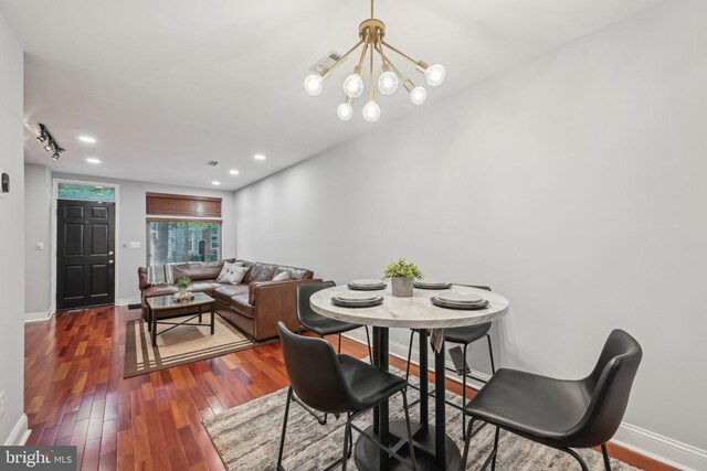 935 S Kenwood Ave, Baltimore, MD 21224 - dining room featuring an inviting chandelier, hardwood / wood-style flooring, baseboards, and recessed lighting