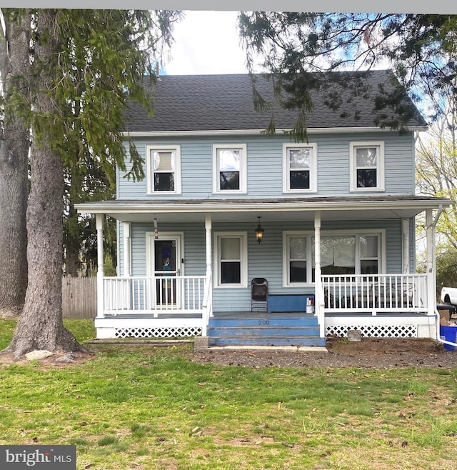 200 E Pacific Ave, Minotola, NJ 08341 - view of front of house with a porch and a front lawn