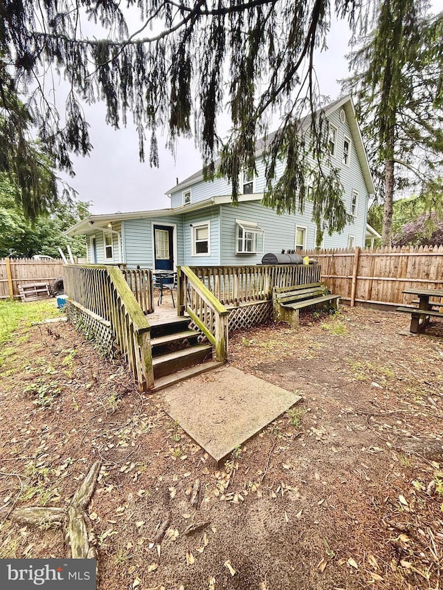 200 E Pacific Ave, Minotola, NJ 08341 - rear view of property featuring a fenced backyard and a deck