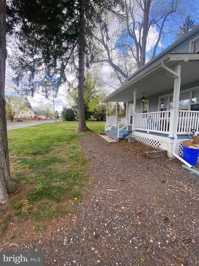 200 E Pacific Ave, Minotola, NJ 08341 - view of yard featuring covered porch