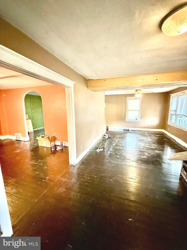 200 E Pacific Ave, Minotola, NJ 08341 - spare room featuring arched walkways, baseboards, and hardwood / wood-style flooring