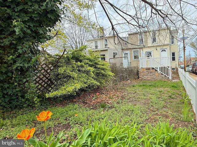 exterior space with fence private yard