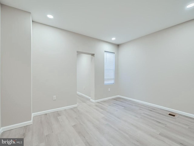 1324 W Pratt St, Baltimore, MD 21223 - empty room featuring wood finished floors and recessed lighting