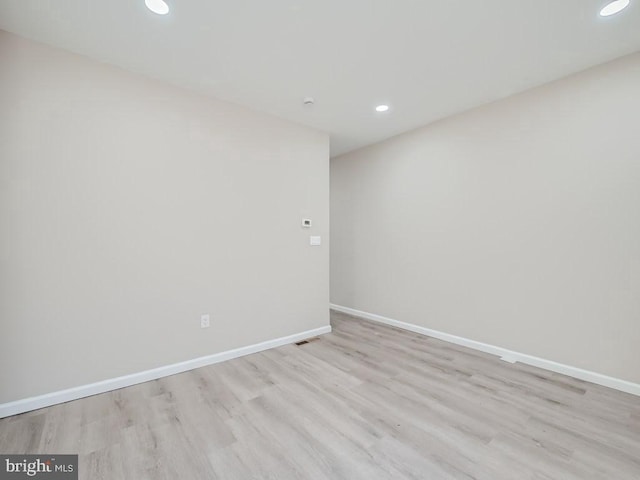 1324 W Pratt St, Baltimore, MD 21223 - spare room with recessed lighting and wood finished floors