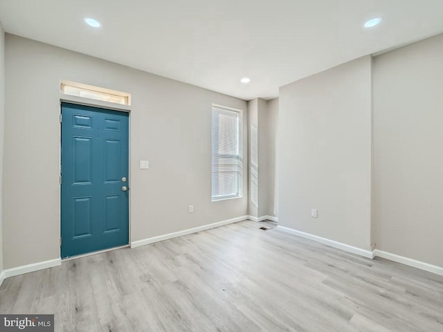 1324 W Pratt St, Baltimore, MD 21223 - foyer entrance featuring wood finished floors and recessed lighting