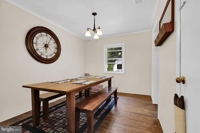 13 Ash Dr, Knoxville, MD 21758 - dining room with crown molding, an inviting chandelier, dark wood-style floors, and visible vents