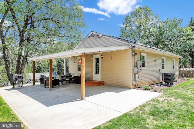 13 Ash Dr, Knoxville, MD 21758 - back of property with driveway, a lawn, central AC unit, a patio area, and fence