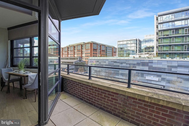 balcony featuring a view of city