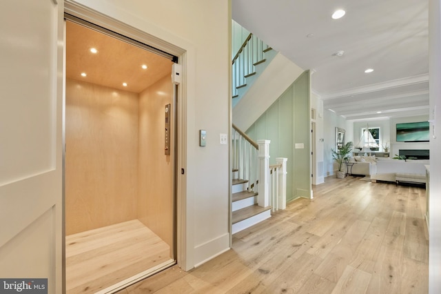 938A Benning Rd, Galesville, MD 20765 - hall with stairway, elevator, and wood finished floors
