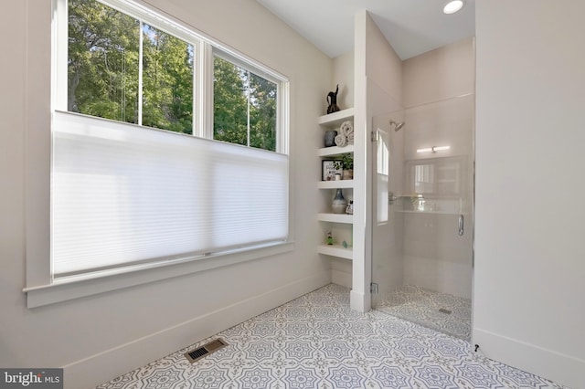 938A Benning Rd, Galesville, MD 20765 - bathroom with visible vents, baseboards, and a stall shower