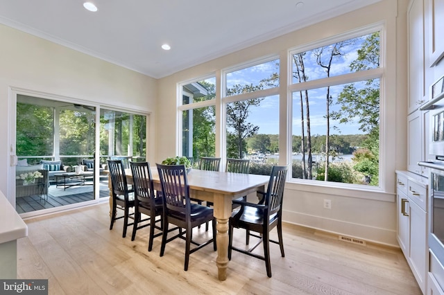 938A Benning Rd, Galesville, MD 20765 - dining room with visible vents, baseboards, ornamental molding, light wood-style floors, and recessed lighting