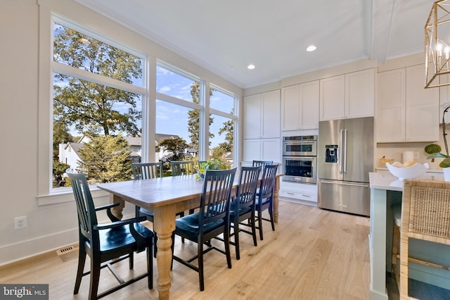 938A Benning Rd, Galesville, MD 20765 - dining room featuring recessed lighting, light wood finished floors, visible vents, and baseboards