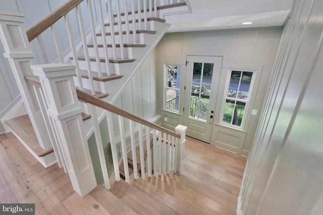 938A Benning Rd, Galesville, MD 20765 - stairway featuring a decorative wall and wood finished floors