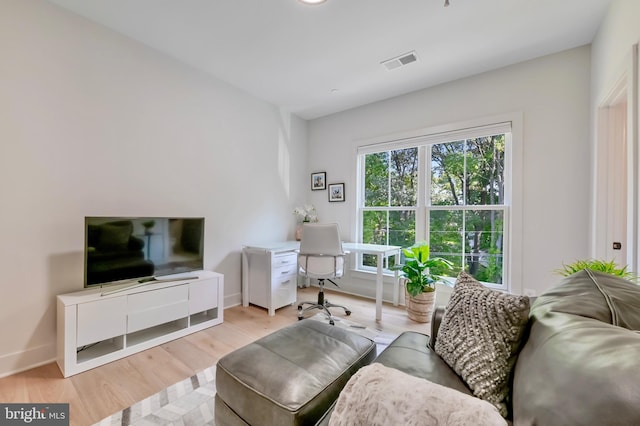 938A Benning Rd, Galesville, MD 20765 - living room with light wood-style floors, visible vents, and baseboards