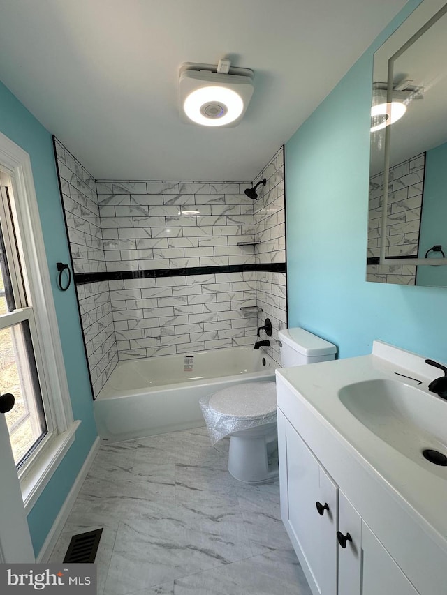 bathroom with toilet, shower / bathtub combination, visible vents, marble finish floor, and vanity