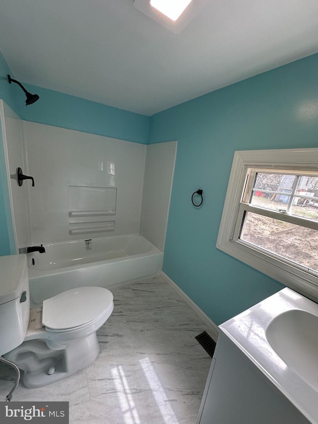 full bath with visible vents, toilet, vanity, baseboards, and shower / bathing tub combination