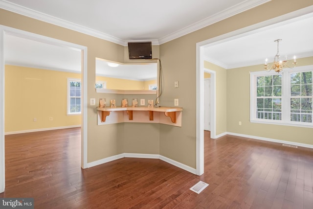 3580 Diamond Point Mews, Dumfries, VA 22026 - interior space with a kitchen bar, dark wood finished floors, an inviting chandelier, and visible vents