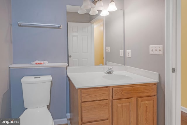 3580 Diamond Point Mews, Dumfries, VA 22026 - bathroom featuring baseboards, toilet, and vanity