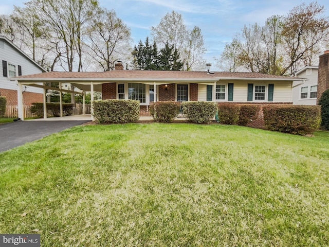 4987 Dequincey Dr, Fairfax, VA 22032 - ranch-style house featuring a front yard, a carport, a chimney, brick siding, and driveway