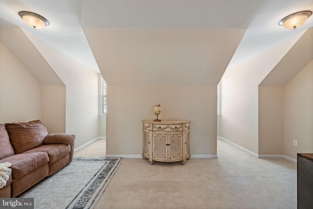 13945 Hollow Wind Way Unit 201, Woodbridge, VA 22191 - additional living space with baseboards, lofted ceiling, and light colored carpet