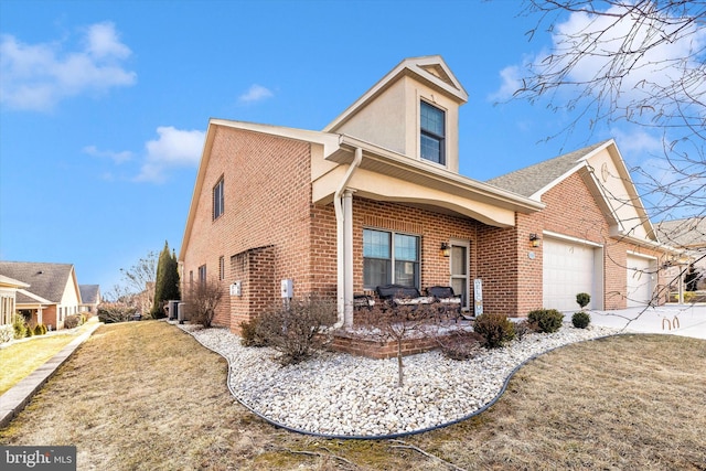 view of front of property featuring concrete driveway, brick siding, and an attached garage