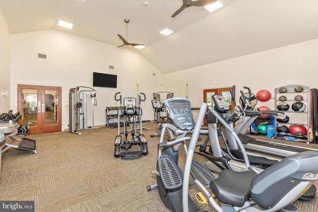 gym with light colored carpet, french doors, ceiling fan, and high vaulted ceiling