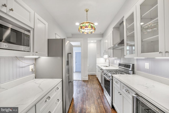 4516 13th St NW, Washington, DC 20011 - kitchen featuring appliances with stainless steel finishes, a sink, white cabinetry, dark wood-style flooring, and glass insert cabinets