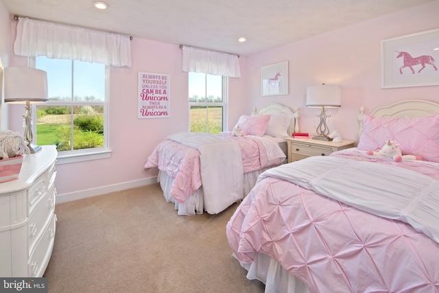 bedroom featuring baseboards, recessed lighting, and light colored carpet