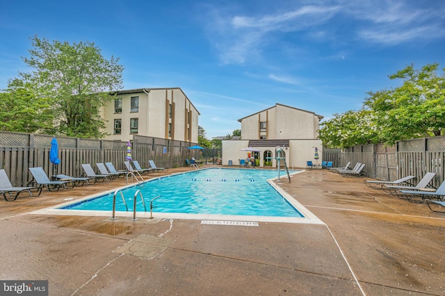623 Center St Unit 101, Herndon, VA 20170 - community pool featuring a patio area