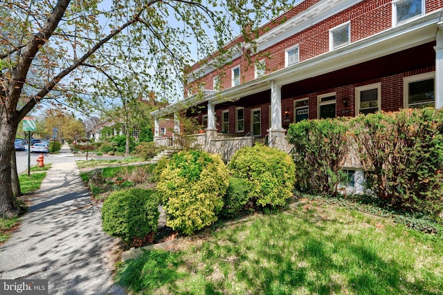 view of home's exterior featuring brick siding