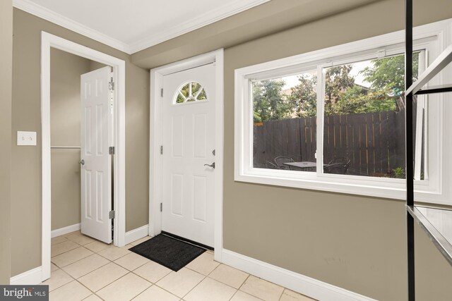 1936 Capitol Ave NE, Washington, DC 20002 - foyer featuring ornamental molding, baseboards, and light tile patterned flooring