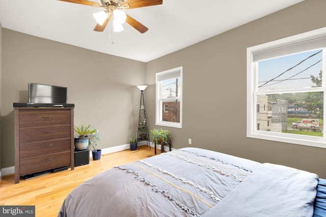 1936 Capitol Ave NE, Washington, DC 20002 - bedroom with wood finished floors, baseboards, and a ceiling fan