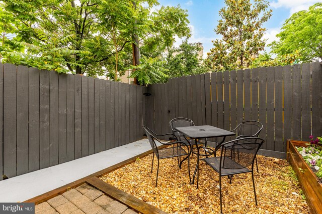 1936 Capitol Ave NE, Washington, DC 20002 - view of patio / terrace featuring a fenced backyard and outdoor dining space