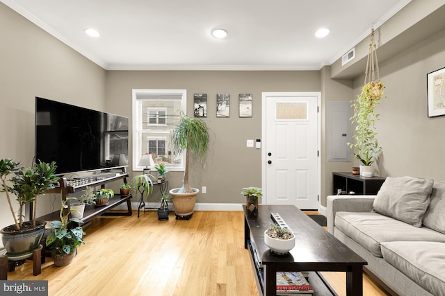 1936 Capitol Ave NE, Washington, DC 20002 - living area with ornamental molding, wood finished floors, recessed lighting, and baseboards