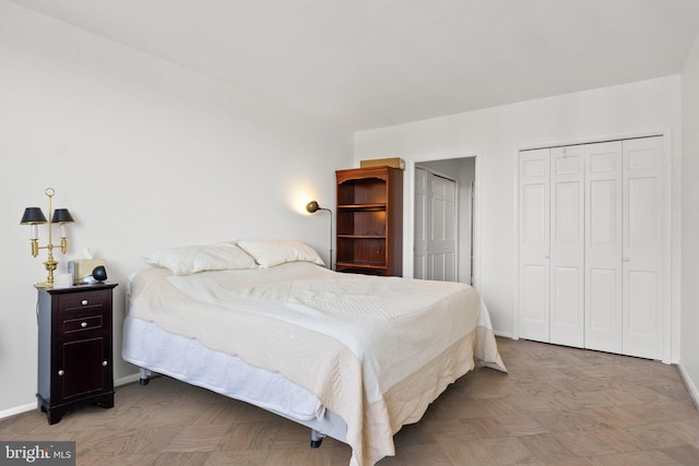 2700 Virginia Ave NW Unit 808, Washington, DC 20037 - bedroom featuring two closets and baseboards