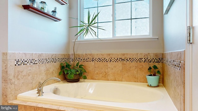 full bathroom with a bath