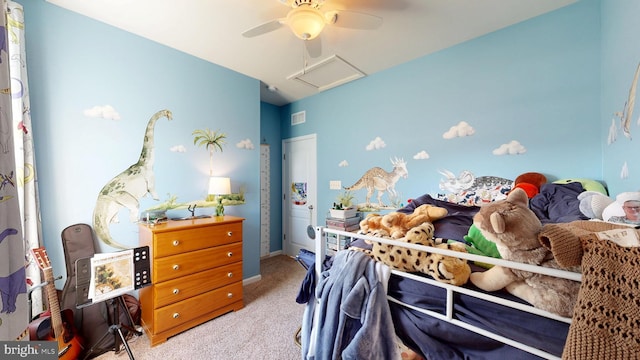 bedroom with attic access, ceiling fan, carpet flooring, and visible vents