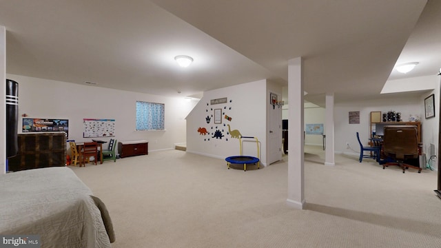 carpeted bedroom featuring baseboards