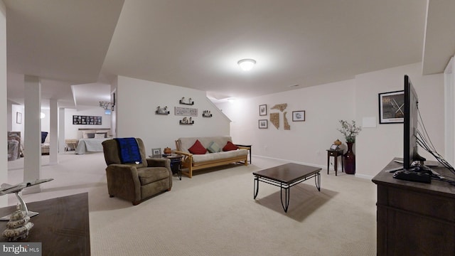 living room featuring light carpet