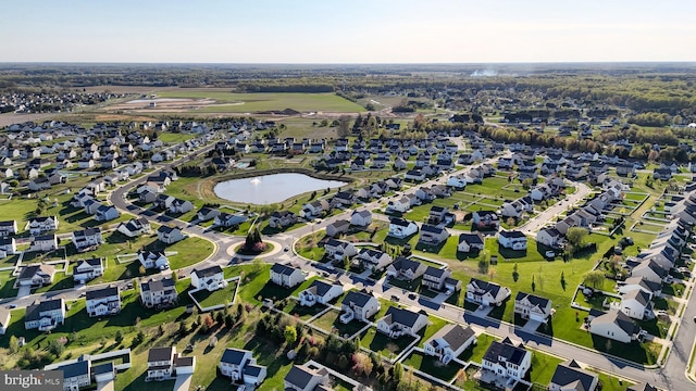 aerial view with a residential view and a water view
