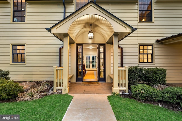 entrance to property featuring french doors
