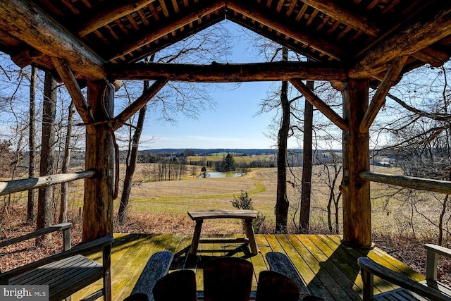 wooden terrace with a water view