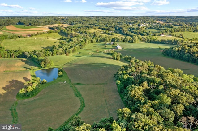 drone / aerial view featuring a water view and golf course view