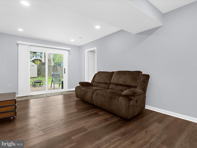 living area featuring wood finished floors, recessed lighting, and baseboards