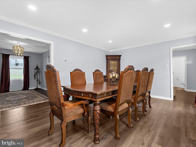 dining room with wood finished floors, baseboards, recessed lighting, and ornamental molding